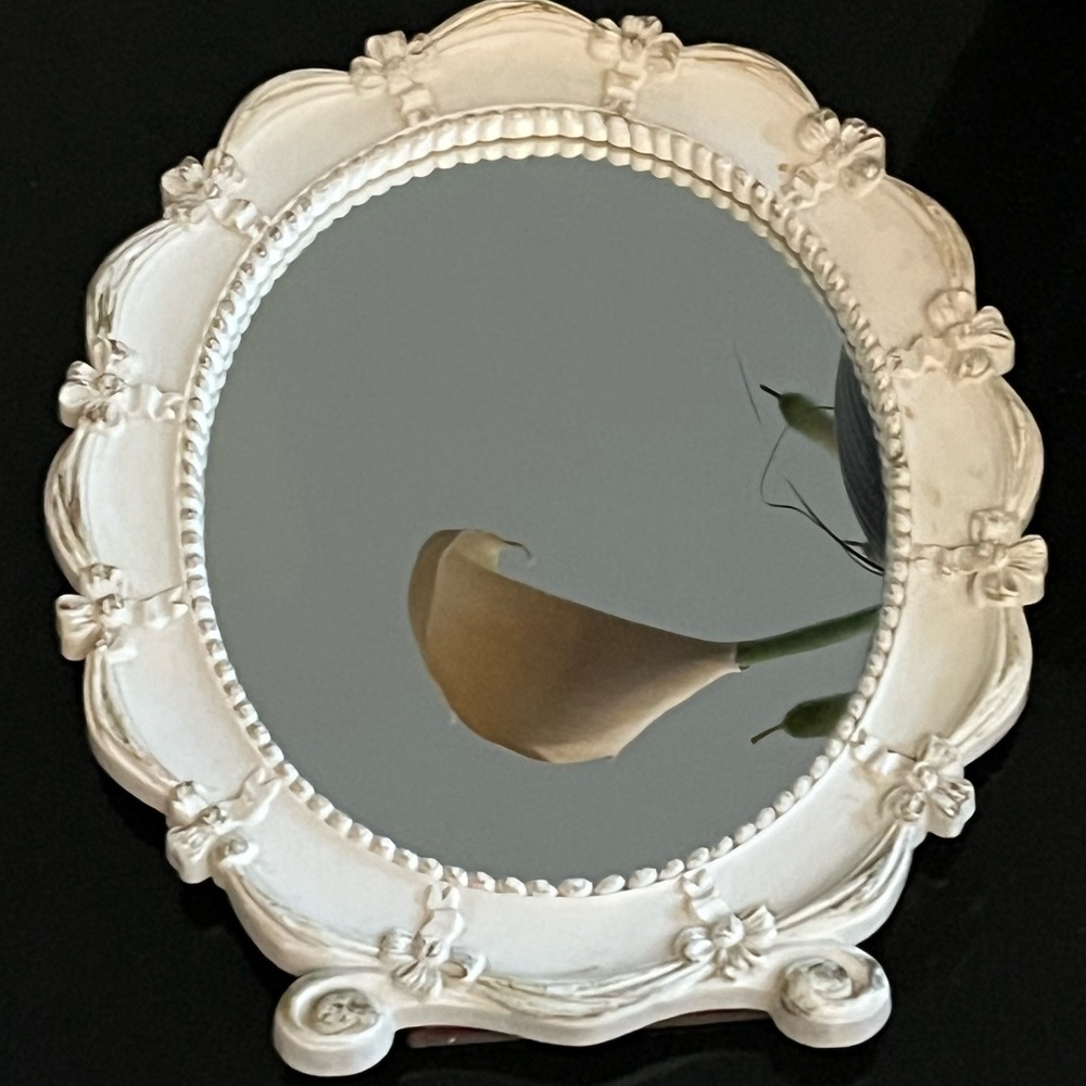 Vintage 1943 mirror Size 13 by 9 inches Firm Price!